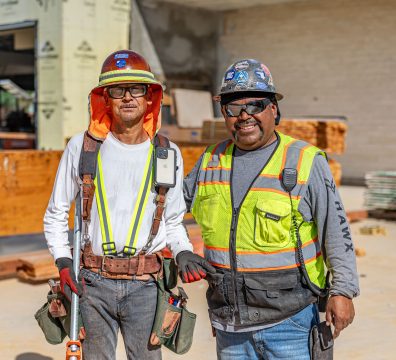 image of 2 persons working in a wood framing company