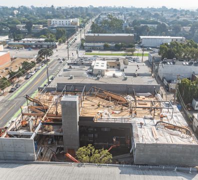 Visible wooden beams and studs forming the frame of a house under construction.